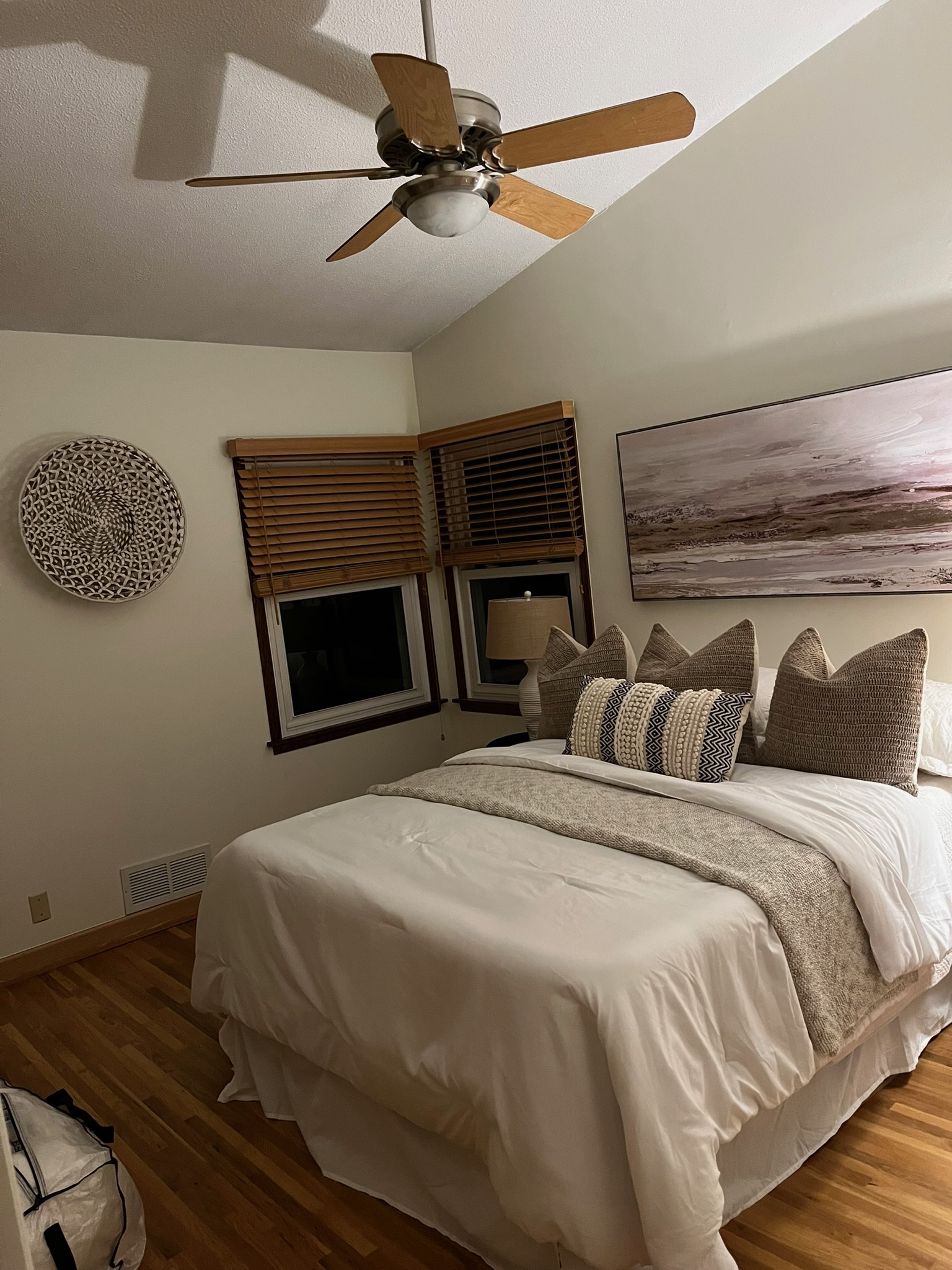 Beautifully painted bedroom with warm neutral tones in Fort Collins home