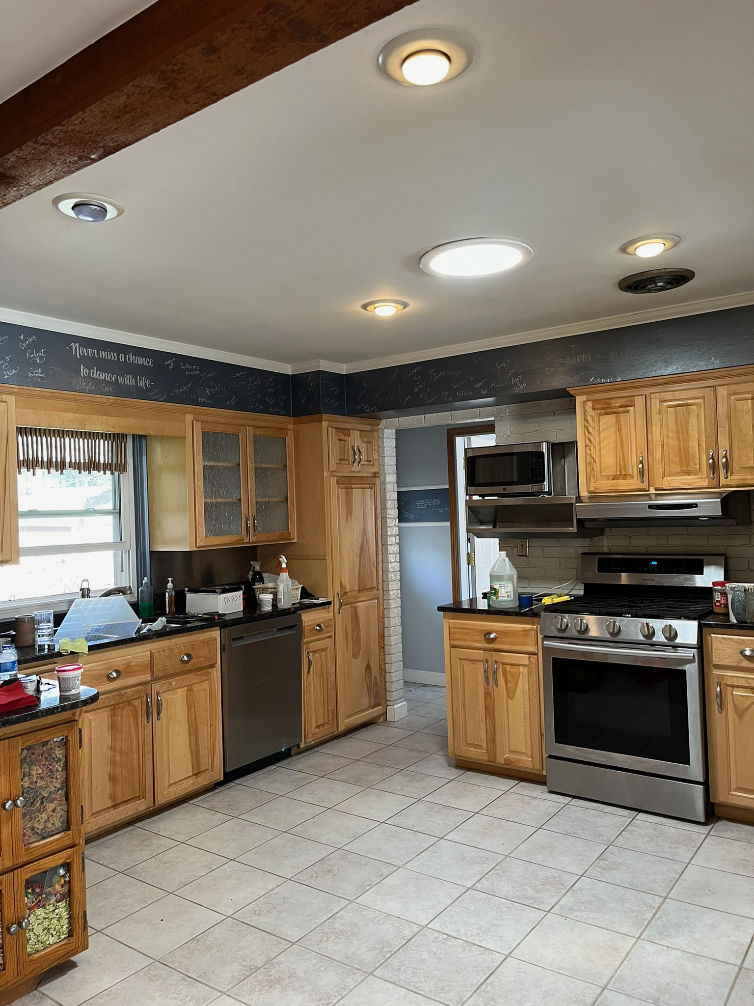 Kitchen with freshly painted walls and chalkboard accent in Fort Collins